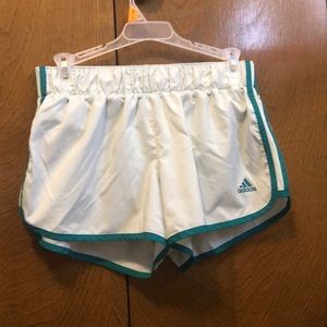 Light teal adidas running shorts